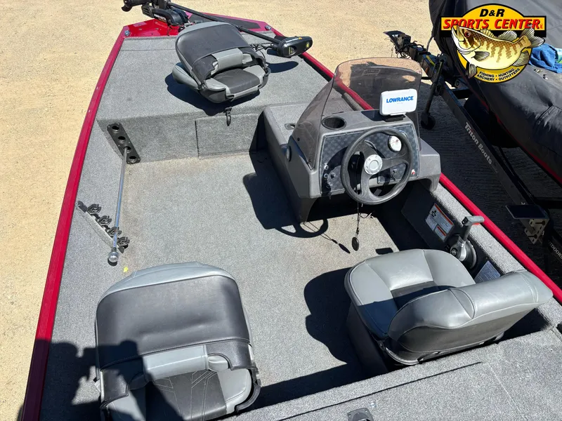 Slide: The Image of 2021 Tracker Bass Tracker Classic XL boat interior with steering console and seating. - 3