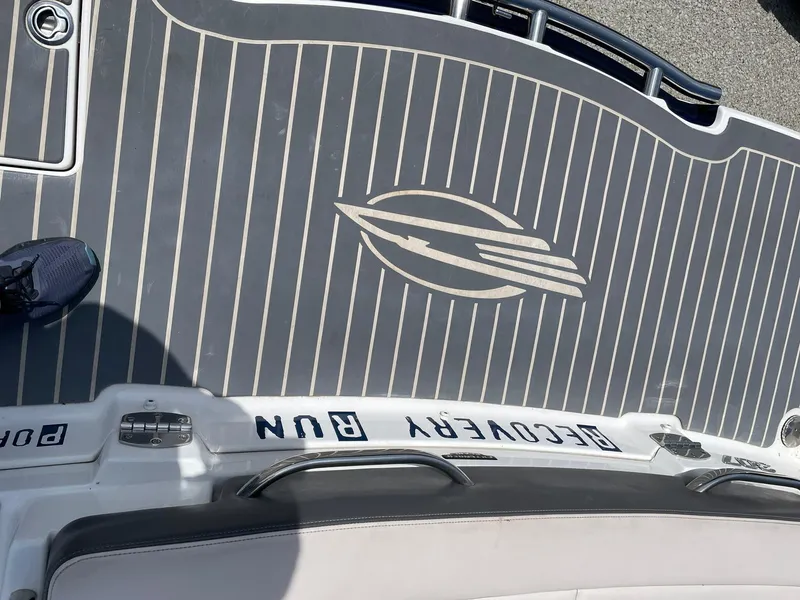 Slide: The Image of 2017 Chaparral 307 SSX boat deck with logo and striped design. - 25