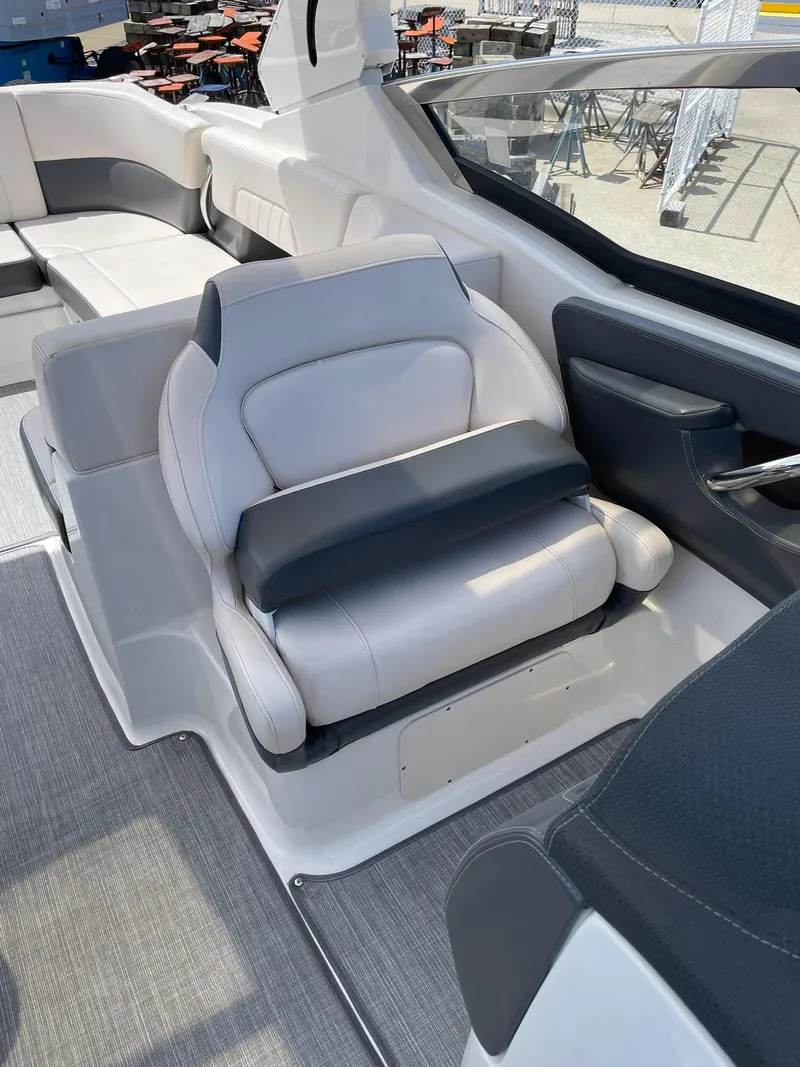 Slide: The Image of 2017 Chaparral 307 SSX boat interior with plush seating and modern design. - 7