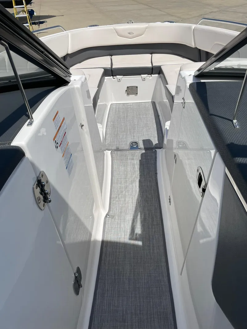 Slide: The Image of 2017 Chaparral 307 SSX boat interior with sleek design and spacious seating. - 9