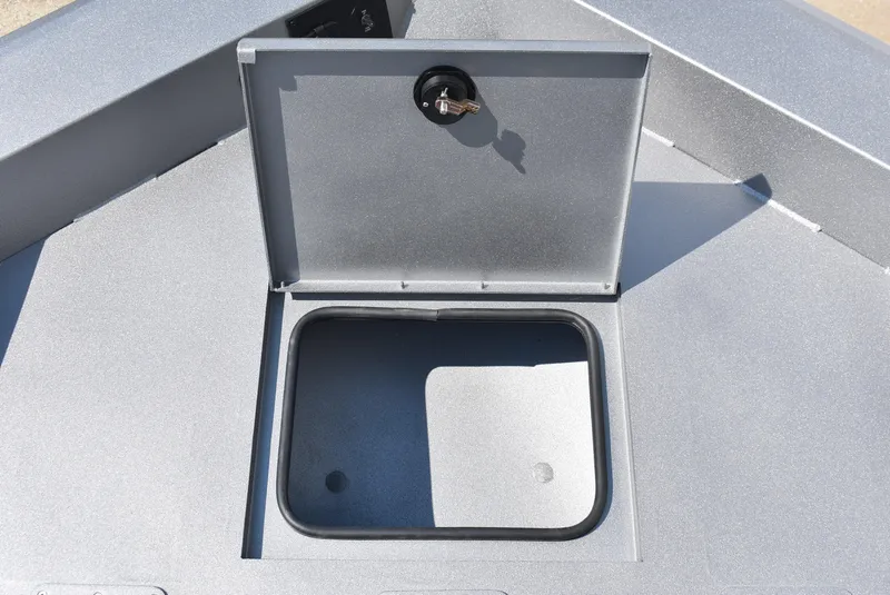 Slide: The Image of Open storage compartment on 2025 Lowe Outlet 20 boat deck. - 14