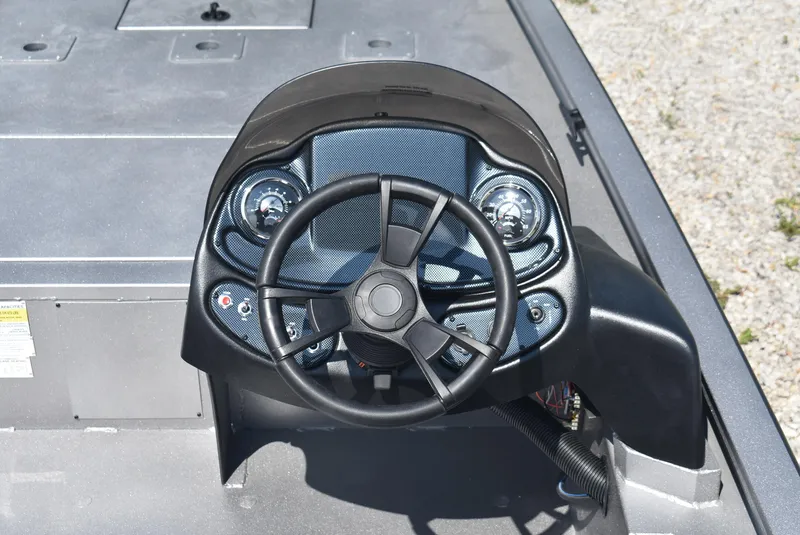 Slide: The Image of Steering console of 2025 Lowe Outlet 20 boat, featuring modern controls and dashboard. - 8