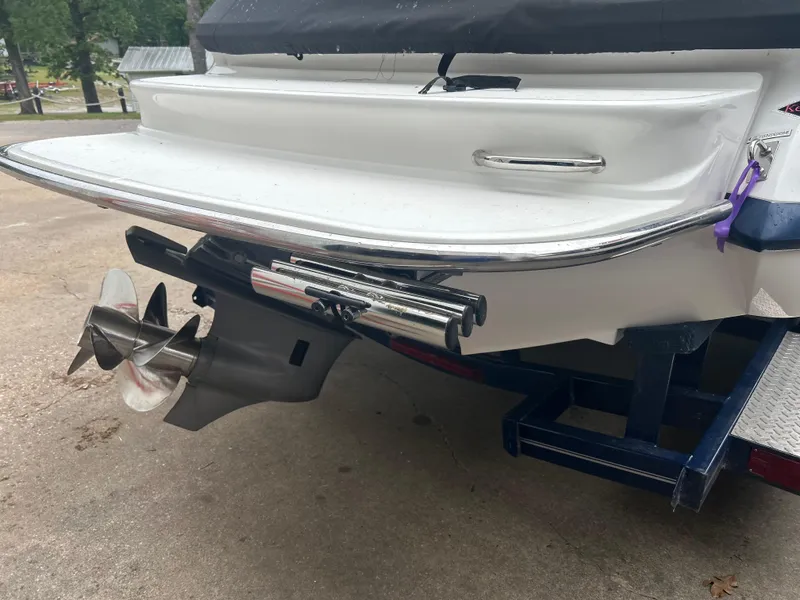 Slide: The Image of Rear view of a 2008 Cobalt 230 boat with propeller and swim platform. - 2