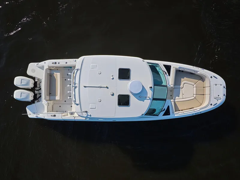 Slide: The Image of Aerial view of 2016 Boston Whaler 320 Vantage boat on dark water. - 39