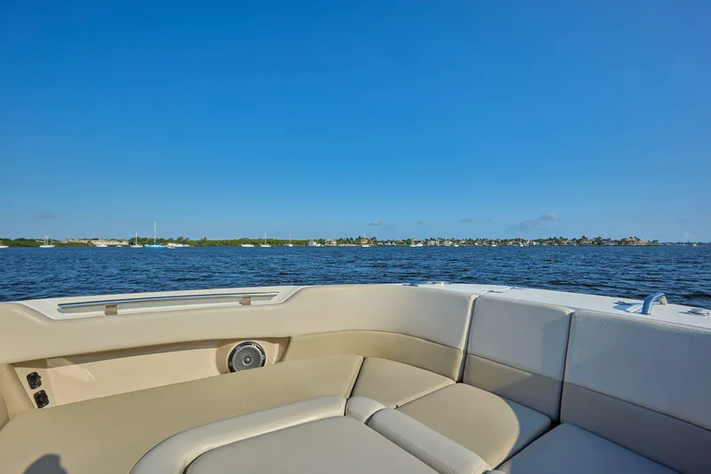 Slide: The Image of 2016 Boston Whaler 320 Vantage boat interior with scenic water view. - 5