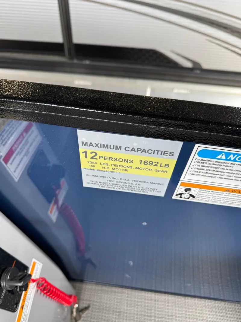 Slide: The Image of 2025 Veranda Vista View 20RC capacity label, 12 persons, 1692 lbs maximum. - 6