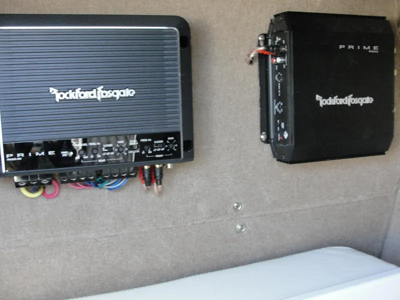 Slide: The Image of Rockford Fosgate amplifiers installed in a 2013 Cobalt A25 boat. - 49