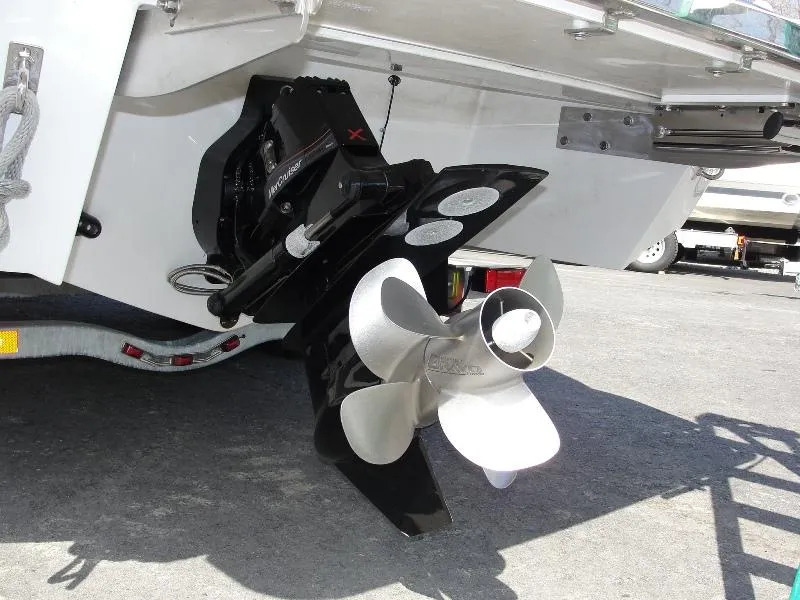 Slide: The Image of Stern view of 2013 Cobalt A25 boat with propeller and outdrive. - 5