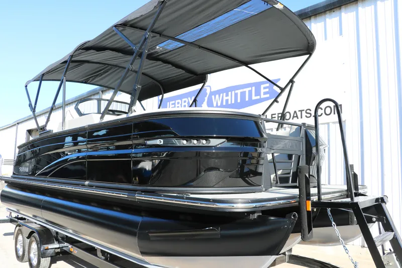 Slide: The Image of 2025 Sylvan G3 CLZ DH pontoon boat with canopy on trailer, side view. - 10