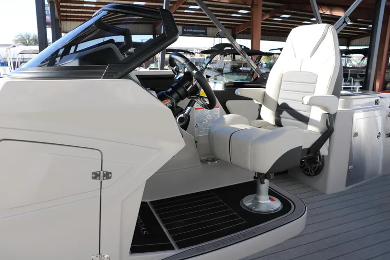 Slide: The Image of 2025 Sylvan G3 CLZ DH boat interior with modern helm and comfortable captain's chair. - 28