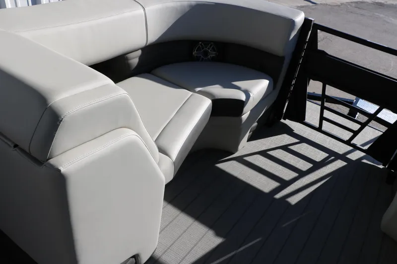 Slide: The Image of 2025 Sylvan G3 CLZ DH boat interior with beige seating and flooring. - 33