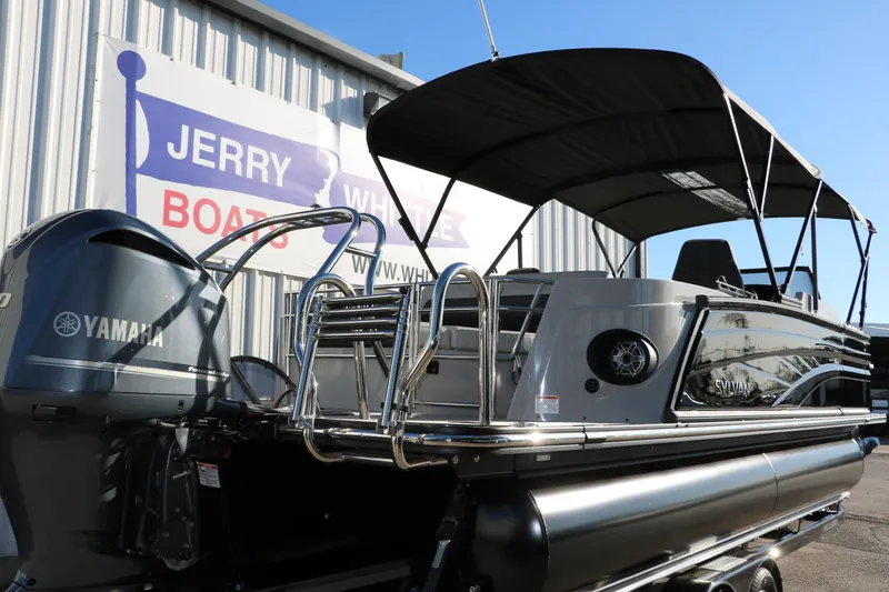 Slide: The Image of 2025 Sylvan G3 CLZ DH pontoon boat with Yamaha engine at dealership. - 4