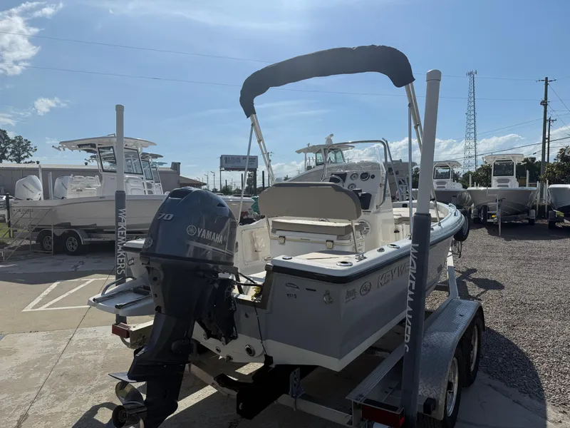 Slide: The Image of 2023 Key West 1720 Center Console boat on trailer, featuring Yamaha outboard motor. - 10