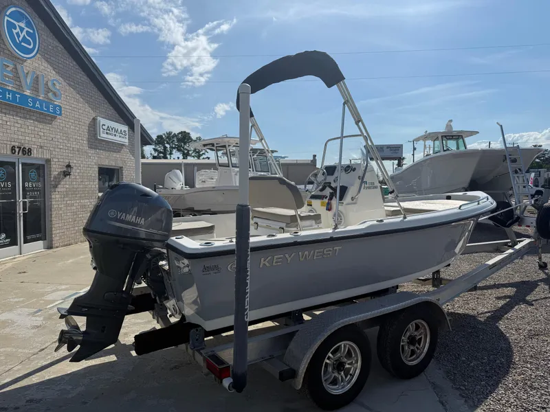 Slide: The Image of 2023 Key West 1720 Center Console boat on trailer at dealership. - 11
