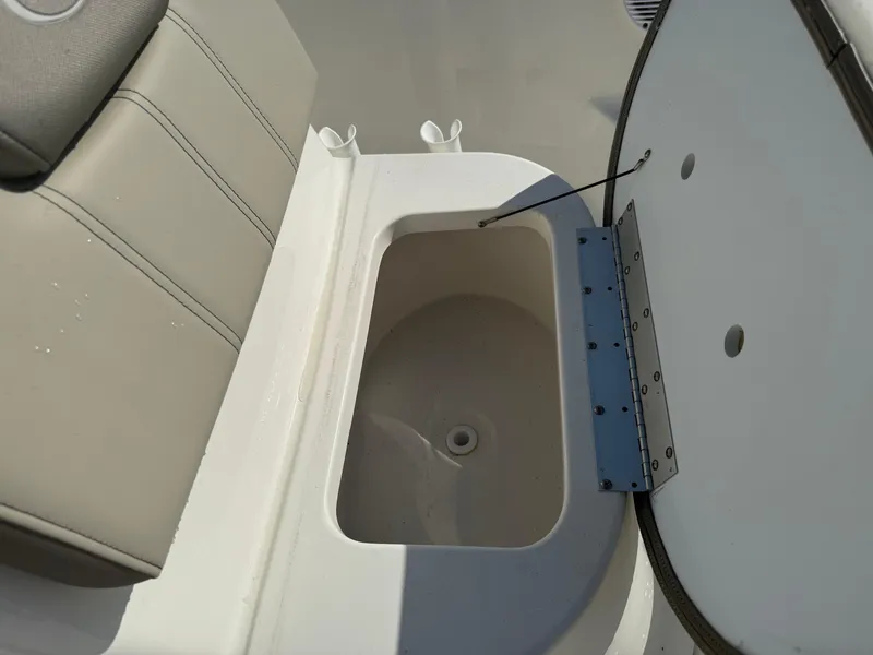 Slide: The Image of 2023 Key West 1720 Center Console boat with open storage compartment. - 14