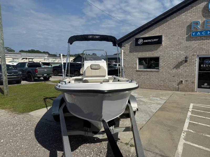 Slide: The Image of 2023 Key West 1720 Center Console boat on trailer outside dealership. - 3