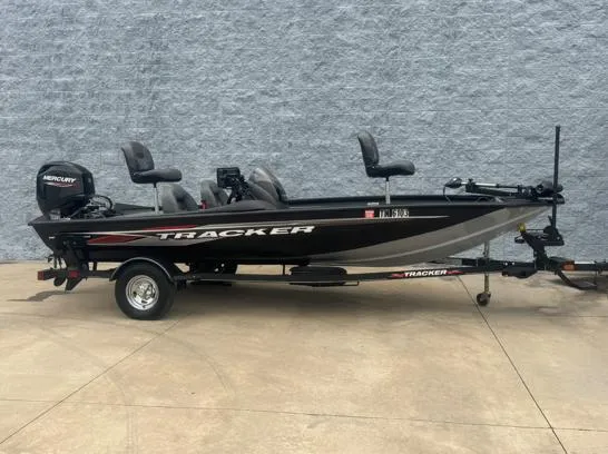 The Image of 2021 Tracker PRO TEAM 175 TWX fishing boat with Mercury engine on trailer. - 1