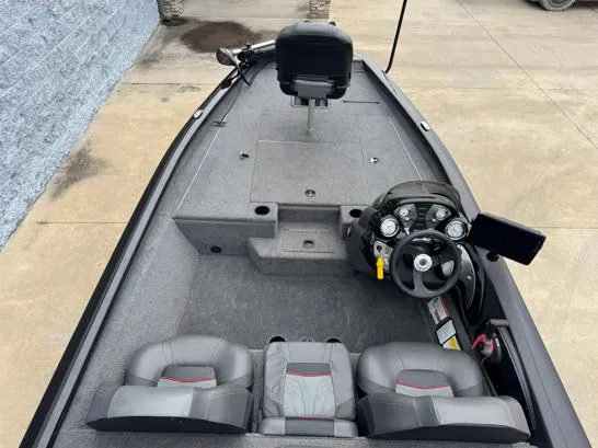 Slide: The Image of 2021 Tracker PRO TEAM 175 TWX boat interior with steering console and seating. - 5