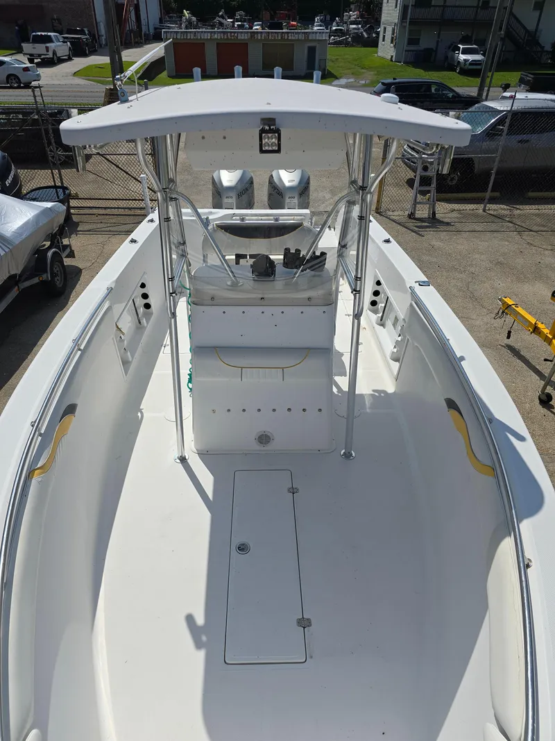 Slide: The Image of 2005 Sea Chaser 2600 Offshore boat with dual engines and spacious deck. - 14