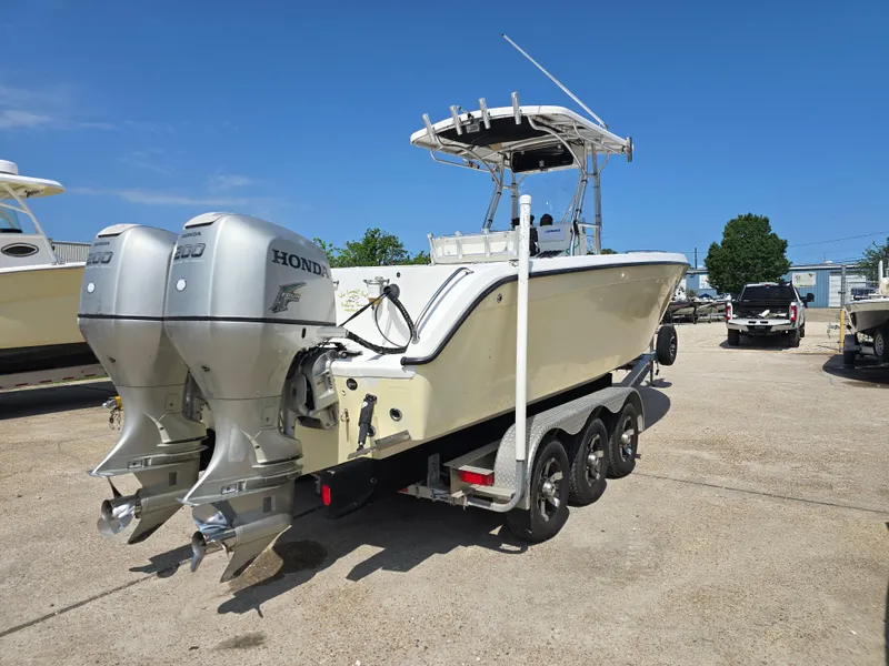 Slide: The Image of 2005 Sea Chaser 2600 Offshore boat with dual Honda outboard engines on a trailer. - 7