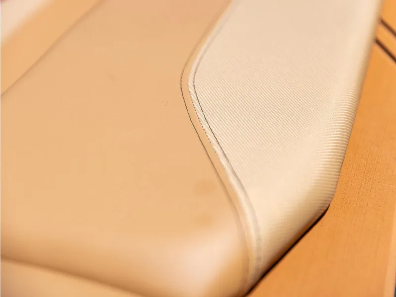 Slide: The Image of 2025 HEYDAY WAKE BOATS WT-SURF interior seat detail, beige upholstery. - 15