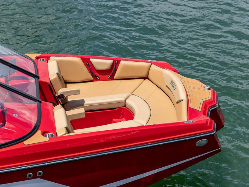 Slide: The Image of 2025 HEYDAY WAKE BOATS WT-SURF with red and beige seating on water. - 18
