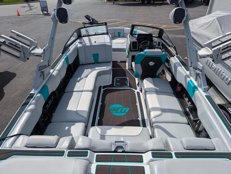 Slide: The Image of 2022 Malibu Wakesetter 23 LSV interior with spacious seating and modern design. - 18
