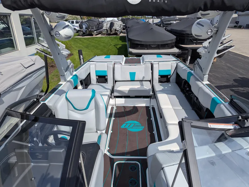 Slide: The Image of 2022 Malibu Wakesetter 23 LSV interior with modern seating and sleek design. - 20