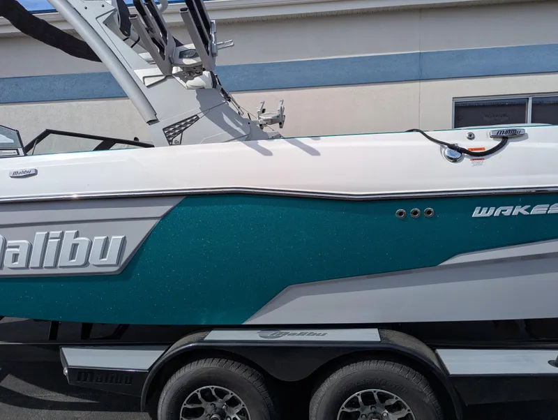 Slide: The Image of 2022 Malibu Wakesetter 23 LSV boat on trailer, side view. - 21