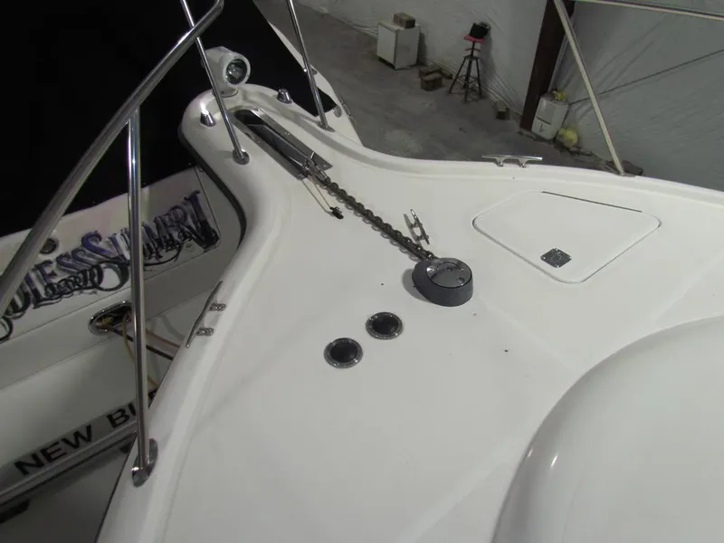 Slide: The Image of 1999 Tiara Yachts 3500 Open deck with anchor chain and fittings. - 17