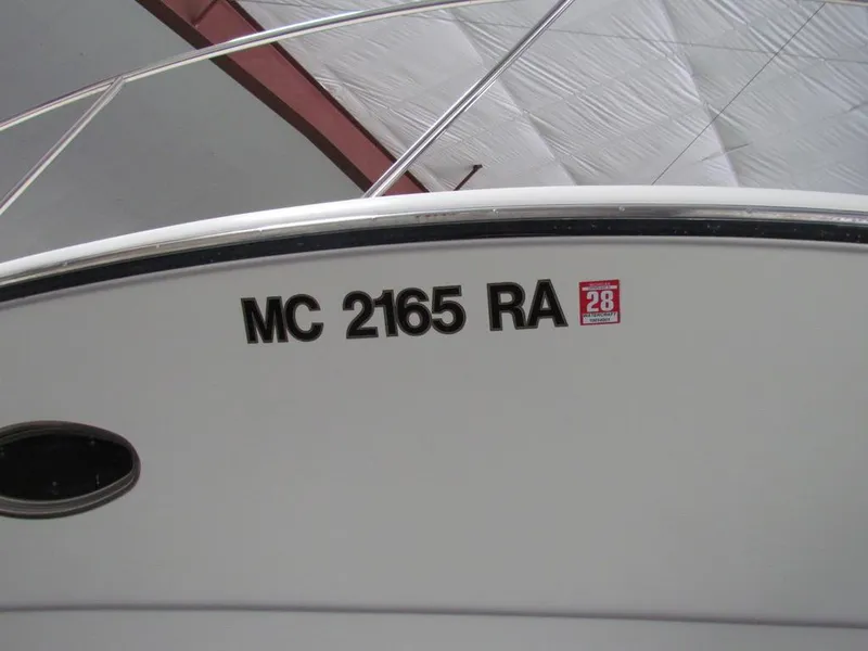 Slide: The Image of 1999 Tiara Yachts 3500 Open with registration MC 2165 RA, docked indoors. - 27