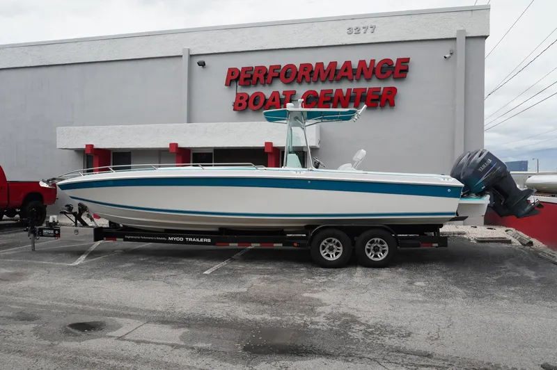 Slide: The Image of 1994 Wellcraft 30 Scarab Sport boat on trailer at Performance Boat Center. - 0