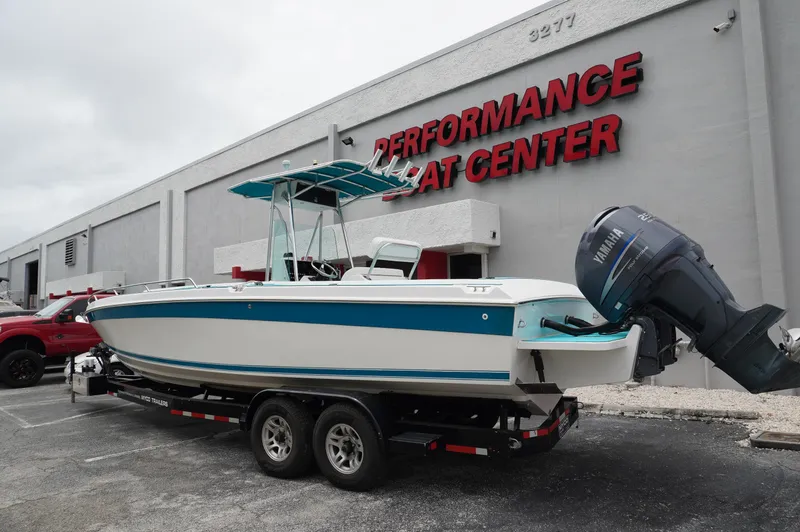 Slide: The Image of 1994 Wellcraft 30 Scarab Sport boat on trailer at Performance Boat Center. - 1