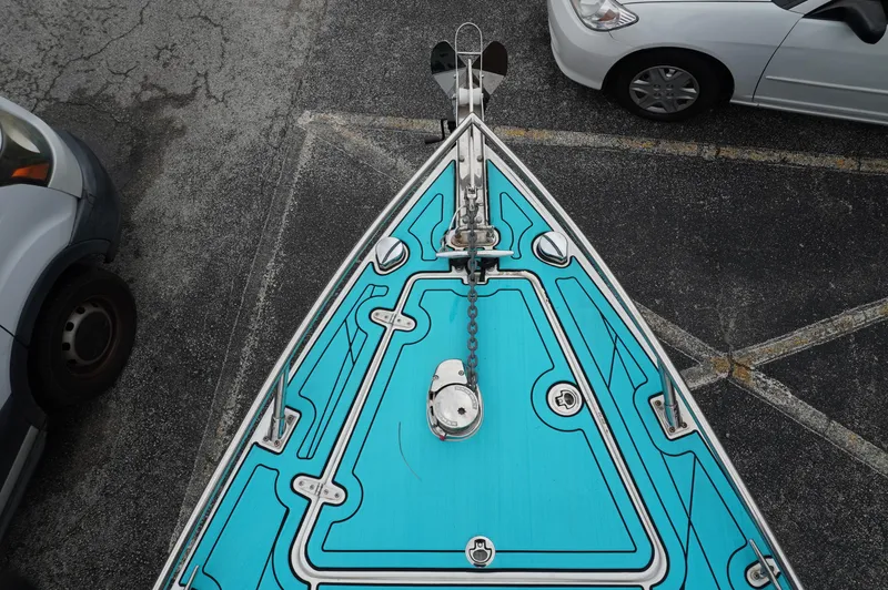 Slide: The Image of Top view of 1994 Wellcraft 30 Scarab Sport boat in parking lot. - 10