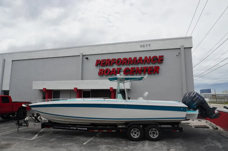 Slide: The Image of 1994 Wellcraft 30 Scarab Sport boat on trailer at Performance Boat Center. - 20