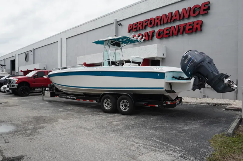 Slide: The Image of 1994 Wellcraft 30 Scarab Sport boat on trailer at Performance Boat Center. - 21