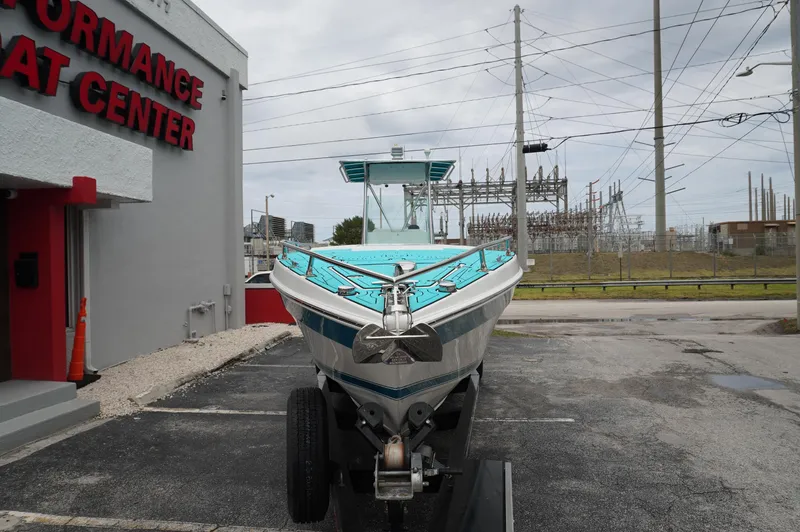 Slide: The Image of 1994 Wellcraft 30 Scarab Sport boat on trailer outside Performance Boat Center. - 3