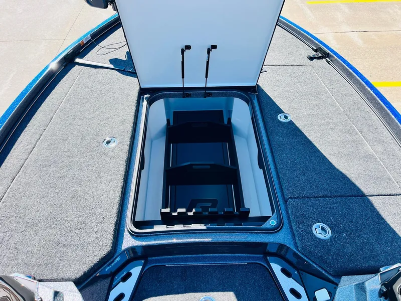 Slide: The Image of 2025 Ranger Z520R Cup-Equipped boat with open storage compartment on deck. - 16