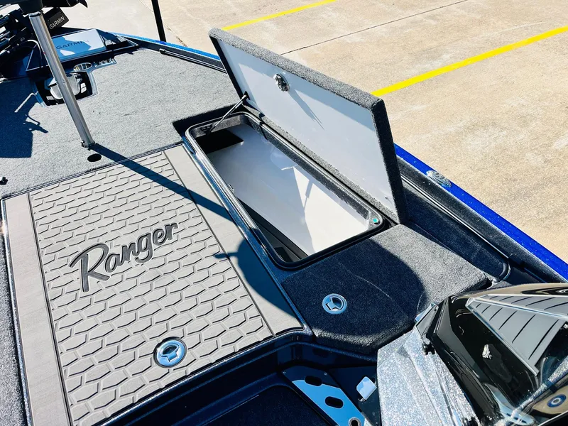 Slide: The Image of 2025 Ranger Z520R Cup-Equipped boat with open storage compartment on deck. - 18