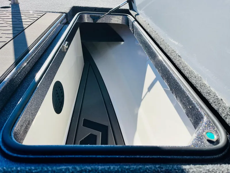 Slide: The Image of 2025 Ranger Z520R Cup-Equipped boat storage compartment, open and empty. - 19