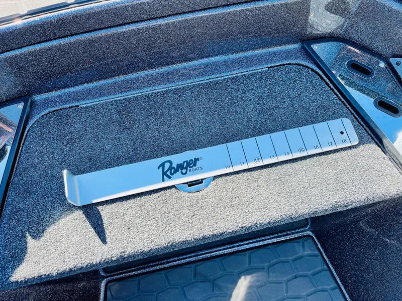 Slide: The Image of Ranger Z520R Cup-Equipped 2025 boat deck with measuring tool. - 25