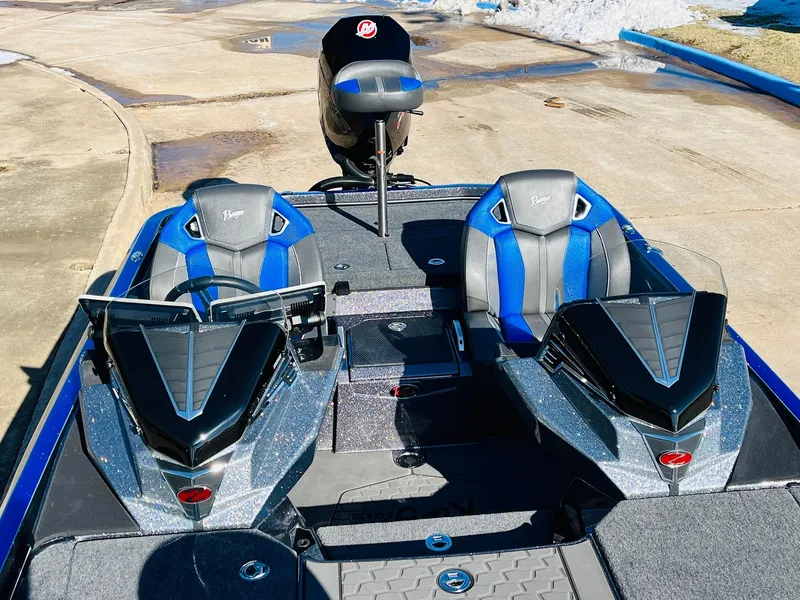 Slide: The Image of 2025 Ranger Z520R Cup-Equipped boat with dual seats and sleek design on a sunny day. - 26