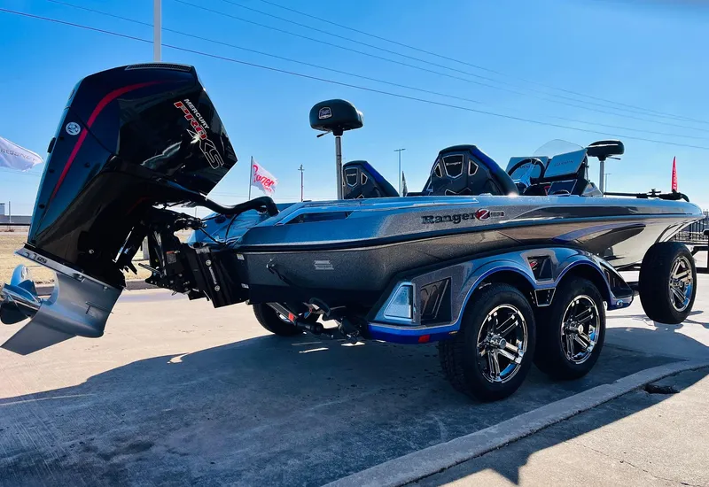 Slide: The Image of 2025 Ranger Z520R Cup-Equipped boat with dual axles and powerful outboard motor. - 4