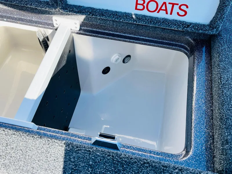 Slide: The Image of 2025 Ranger Z520R Cup-Equipped boat storage compartment, open and empty. - 41
