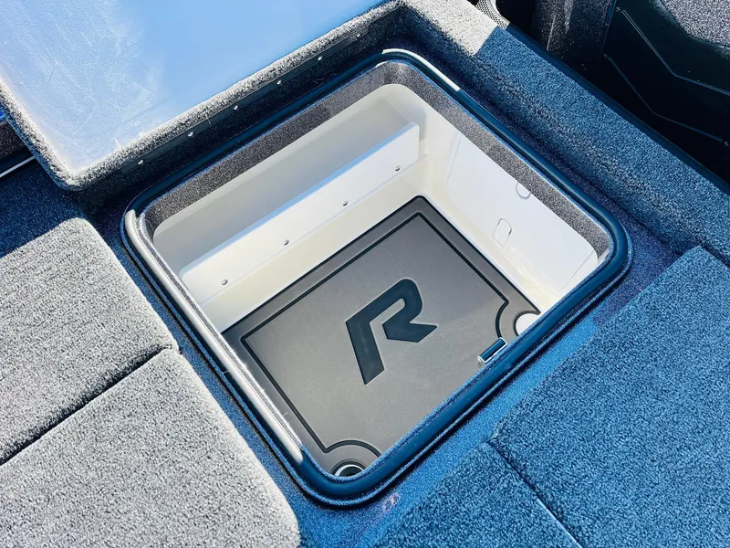 Slide: The Image of 2025 Ranger Z520R Cup-Equipped storage compartment with logo, featuring sleek design and durable materials. - 44