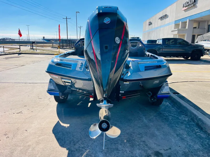 Slide: The Image of 2025 Ranger Z520R Cup-Equipped boat, rear view, parked outdoors on a sunny day. - 5