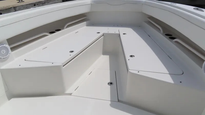 Slide: The Image of 2013 Jupiter 34 boat deck with spacious seating and storage compartments. - 10