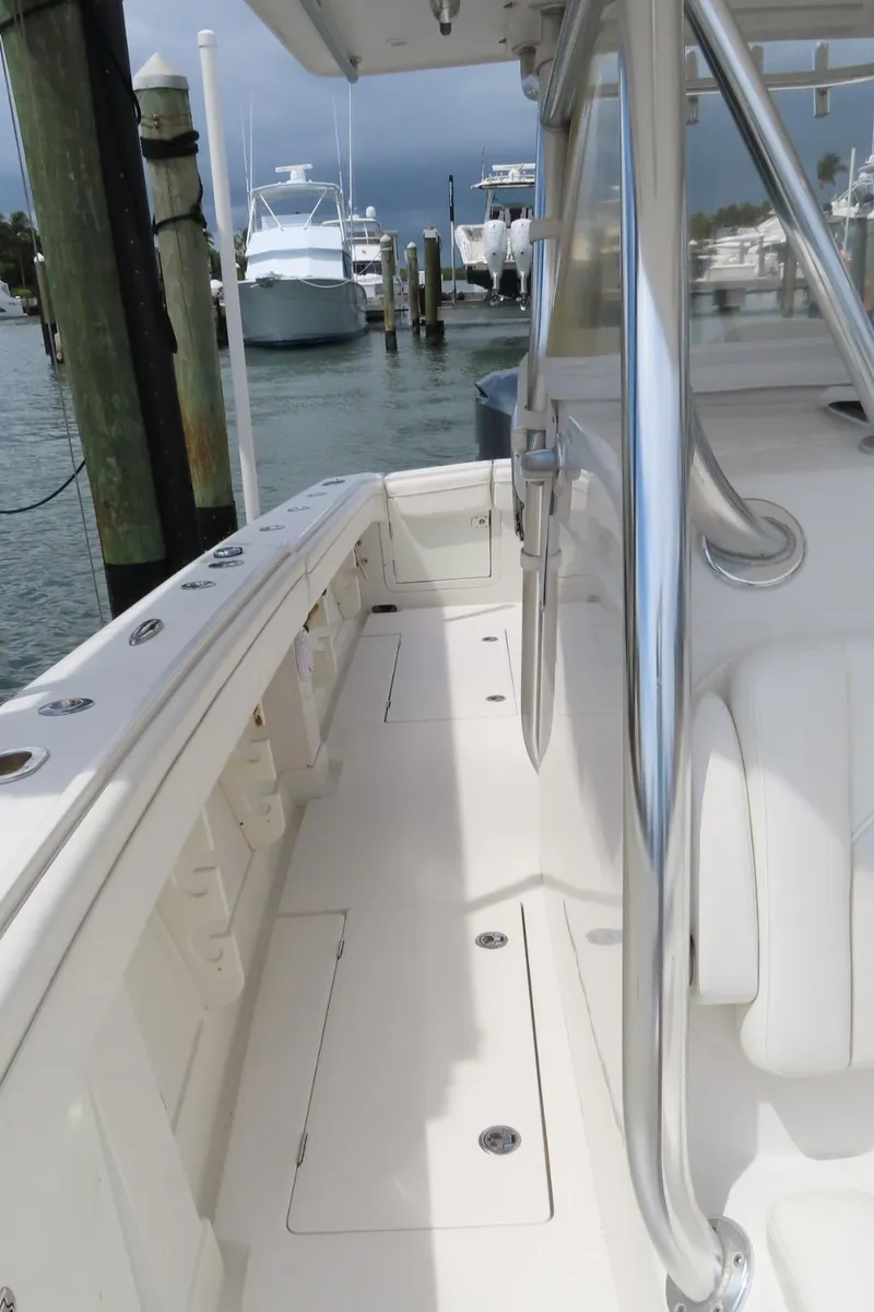 Slide: The Image of 2013 Jupiter 34 boat deck with sleek design and stainless steel features. - 13