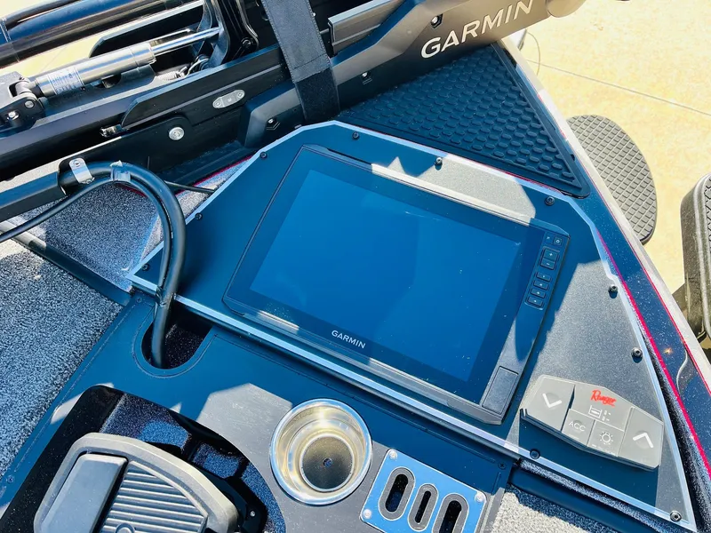Slide: The Image of 2025 Ranger Z520R Cup-Equipped boat dashboard with Garmin display and controls. - 13