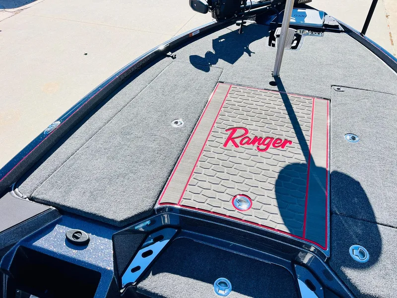 Slide: The Image of 2025 Ranger Z520R Cup-Equipped boat deck with logo and textured mat. - 14